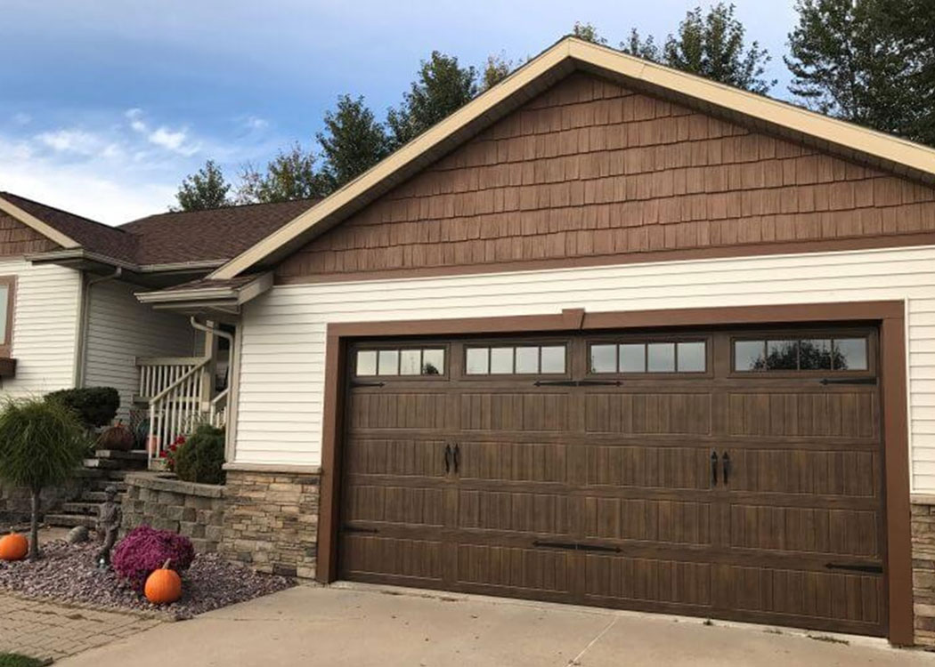 WOOD TONE INSULATED STEEL DOORS